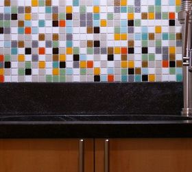 a functional laundry room, Leathered jet mist granite with under mount sink sitting on a custom made maple cabinet and modwalls mosaic tiles above