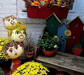 fall decorating time, container gardening, flowers, gardening, halloween decorations, home decor, hydrangea, seasonal holiday d cor, Here s our kitchen deck decorated for Fall with Tipsy Punkin Heads and mums gourds dried oakleaf hydrangea in the window box
