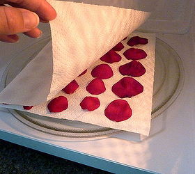 how to dry flowers the fast and easy way, Fold the sheet over the petals and place in the microwave