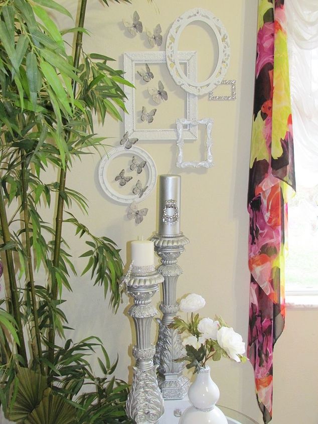 wall gallery for small wall 5 of 5 white and silver d cor accents, crafts, decoupage, home decor, paint colors, wall decor, Added candlesticks on table beneath the wall gallery with items from 2 3 and 4 Wall space and corner makes an eclectic vignette in white and silver I ll change the curtains another day