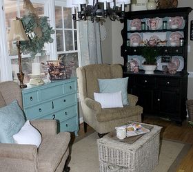 creating a cozy sitting area from another space for virtually free, home decor, living room ideas, painted furniture, A French wicker trunk acts as a coffee table and also holds two throws the grandloves can pull out when they want