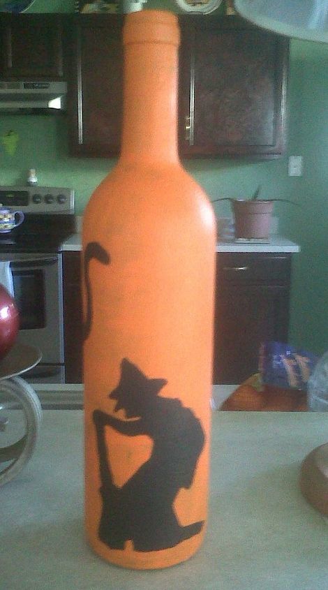 i upcycled empty wine bottles into halloween lamps, crafts, halloween decorations, seasonal holiday decor, painted witch and cat