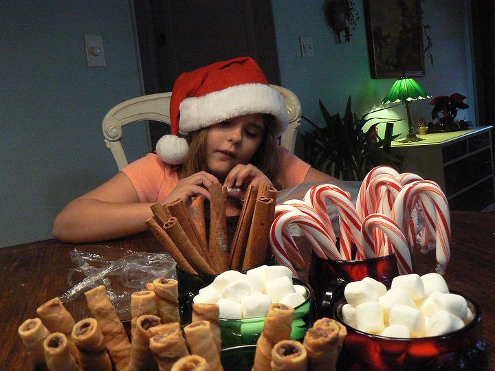 holiday pinterest party, christmas decorations, crafts, seasonal holiday decor, My favorite little elf helped me make all the sweets here she is unwrapping candy canes for peppermint bark