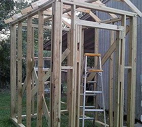greenhouse built for less than 700, diy, gardening, outdoor living, Walls going up Most of the lumber we already had from other projects Bought pressure treated lumber for base