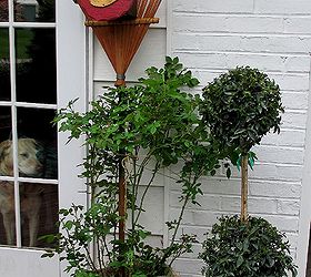 outdoor rake decor, gardening, repurposing upcycling, Rake holds the birdhouse and acts as a trellis for the rose too