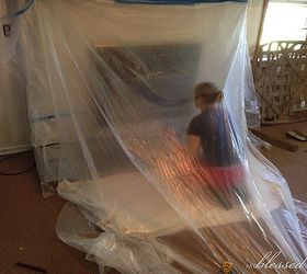transform a brick fireplace with a white wash before after, concrete masonry, fireplaces mantels, painting, This is the tent I made out of plastic for spray painting the gas logs insert