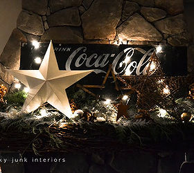 christmas just goes better with coke, christmas decorations, fireplaces mantels, seasonal holiday decor, Here it is lit up at night all glowy and everything A vintage ruler was bent into a star shape to further chime with all things vintage