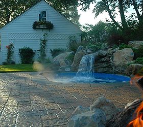 small backyard this spool is the perfect solution, Spool with waterfall gas fire pit and tumble paver patio Pool and spa in one