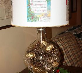 christmas in august lamp decorating challenge, christmas decorations, crafts, decoupage, lighting, seasonal holiday decor, The lamp is filled with both gold spray painted and glittered pine cones