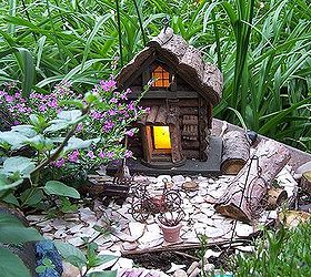 garden ideas, gardening, outdoor living, repurposing upcycling, Plenty of little items to make the fairies feel at home P S The fairies sometimes leave shiny coins for the grand kids