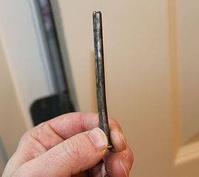 fix a door that closes or opens by itself, doors, home maintenance repairs, how to, Slightly bend the hinge pin using a hammer and scrap piece of wood