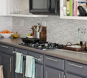our budget kitchen makeover, home decor, kitchen backsplash, kitchen design, Putting in a towel bar on non functioning drawers added a layer of functionality to the cooking zone