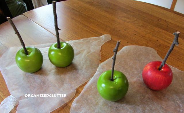 faux caramel apples, crafts, decoupage, seasonal holiday decor, I started with 4 Dollar Tree faux apples stems removed