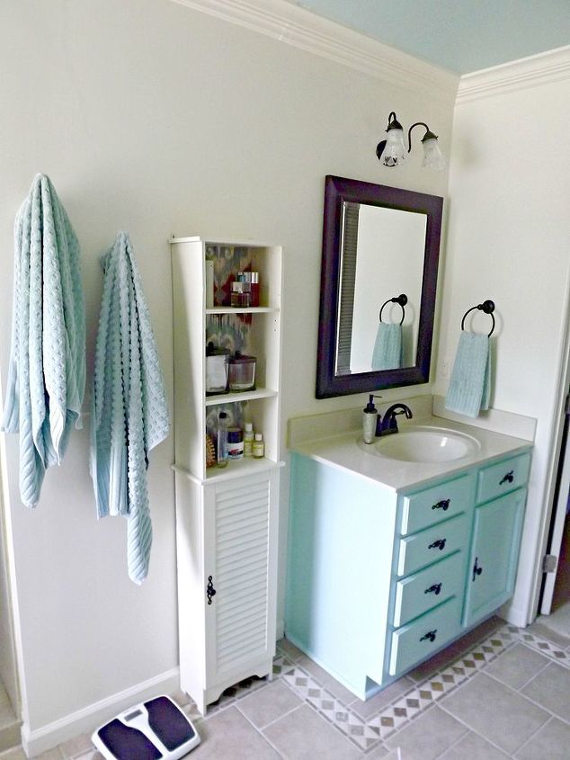 master bathroom makeover, bathroom ideas, home decor, Updated the vanities with new hardware and some leftover paint from the ceiling