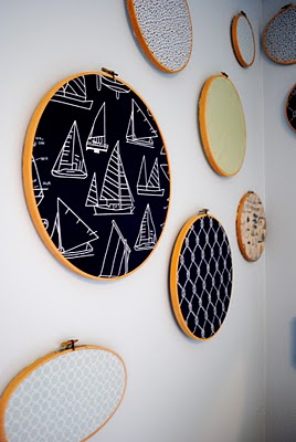 the nautical nursery that changed our lives, bedroom ideas, home decor, Embroidery hoops hold nautical themed fabric for a quick and easy wall display