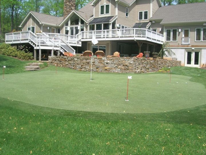 putting greens, landscape, outdoor living, What do you see first the home or the putting green