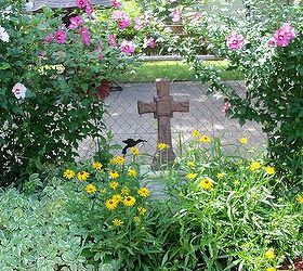 my secret garden in july, flowers, gardening, hibiscus, perennials, raised garden beds, cross in the garden so colorful right now