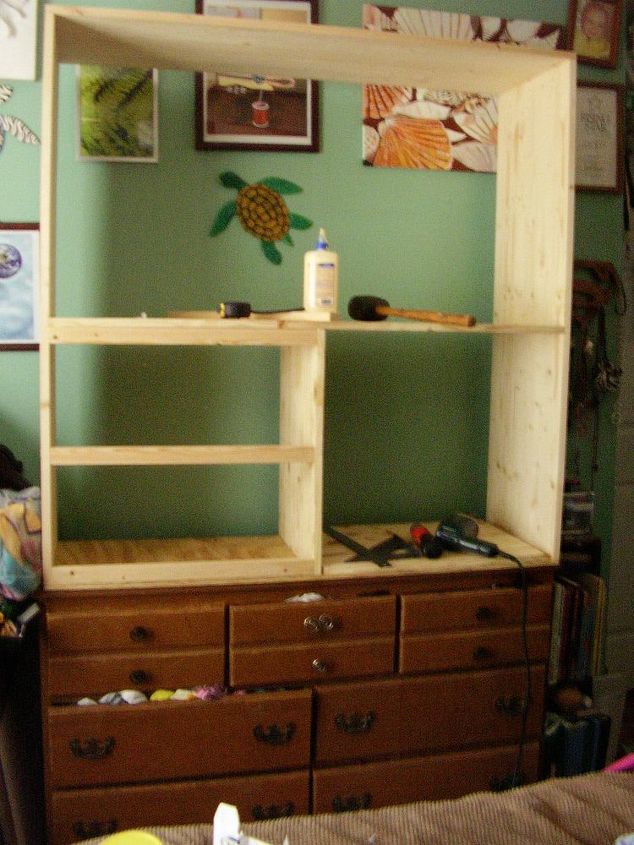 The frame was built using 3 pieces of solid pine 16x48” setting on top of a ½ “ plywood base (since the plywood would be low visibility and save money). Other dividers and shelves can be either solid or Plywood. I used solid wood for looks and strength. I used glue and screws to attack all wall pieces, because this can be separated and moved and screws are far stronger than nails
