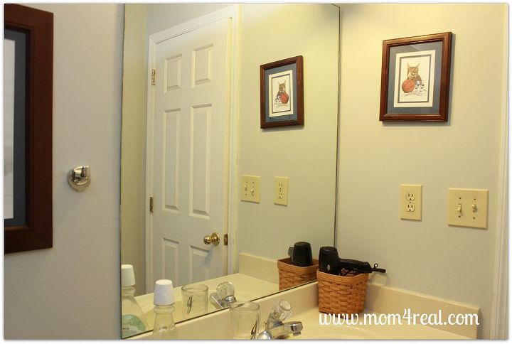 frame out your builder s grade mirrors no mitering required, bathroom ideas, home decor, Raw edged builder s grade mirror