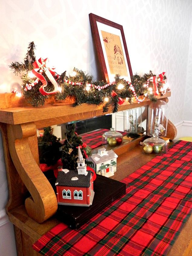 mad for plaid home tour myfavoritethings, crafts, decoupage, living room ideas, seasonal holiday decor, wreaths, Lighted garland and a plaid runner sit on the dining room buffet