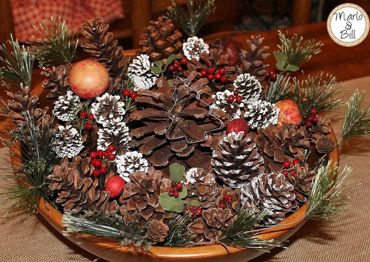 decking the halls with simplistic decor, christmas decorations, seasonal holiday decor, A little greenery some pinecones and a Christmas tree cookie cutter for a wonderful dining room table centerpiece
