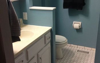 Refinished Bathroom With Mosaic Tiles
