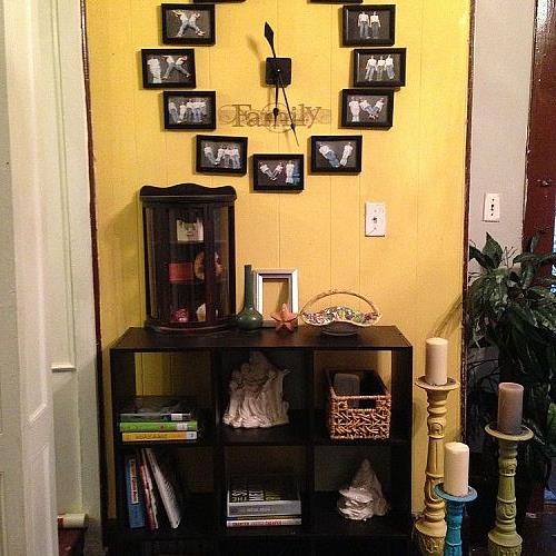 give a plain cube shelf a facelift, painted furniture, shelving ideas, A boring cube shelf gets a facelift Adding scrapbook paper for color