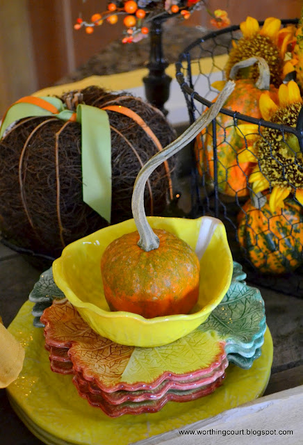 fall vignettes in the kitchen, seasonal holiday decor, Cute little pumpkin with a curly stem nestled in a bowl