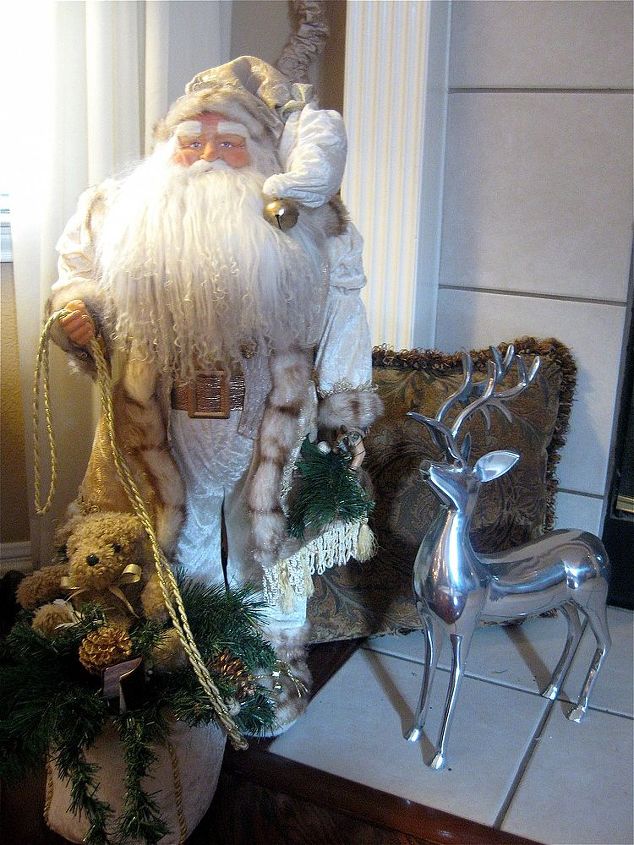 christmas mantel, christmas decorations, seasonal holiday decor, Santa and his reindeer watch over the fire