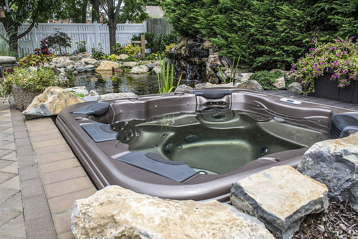 project spotlight love water features love to relax this is the best of both enjoy, outdoor living, patio, ponds water features, pool designs, spas, Bullfrog spa seats 6 people and has great deep tissue massage