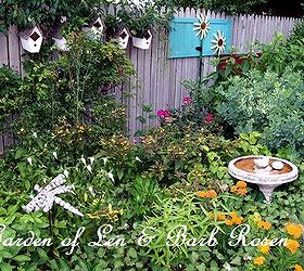 it s all about the birds birdhouses baths and feeders in our garden, gardening, outdoor living, pets animals, repurposing upcycling, Birdhouses mounted on a fence See the post