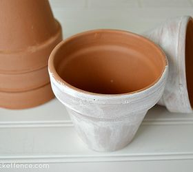 make your spring decor dual purpose, easter decorations, home decor, seasonal holiday decor, Terracotta pots were given a coat of white paint and then I took a wet cloth and rubbed until it gave it an aged look