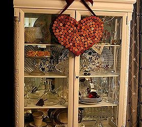 have you got the itch to make something with your wine corks for valentines day, crafts, repurposing upcycling, seasonal holiday decor, valentines day ideas, wreaths, Wrap it in a velvet ribbon and hang it up