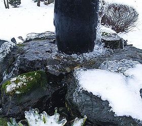 winter water features, ponds water features, Frozen Foilage Below Large Blue Urn