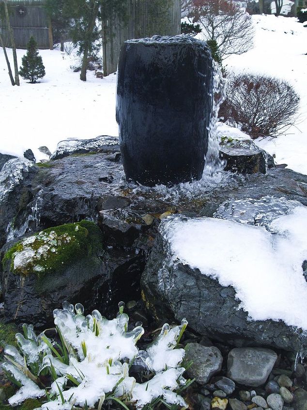 winter water features, ponds water features, Frozen Foilage Below Large Blue Urn