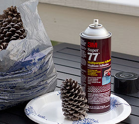 winter wonderland holiday lamp decorating challenge, lighting, seasonal holiday decor, Spray your pine cones with spray adhesive sprinkle with glitter