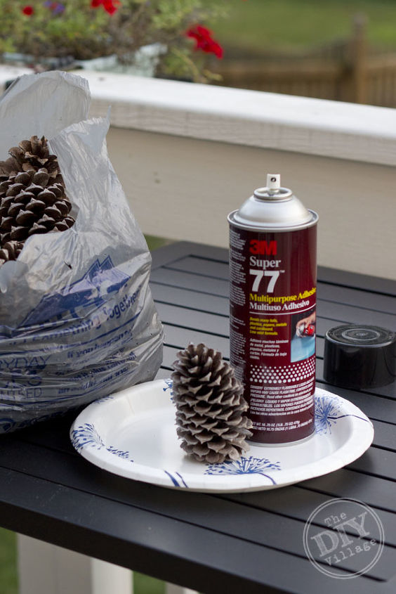 winter wonderland holiday lamp decorating challenge, lighting, seasonal holiday decor, Spray your pine cones with spray adhesive sprinkle with glitter