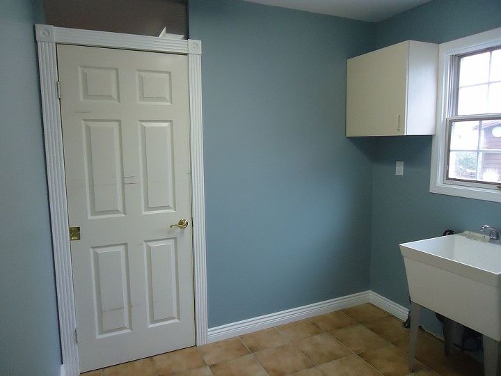 redoing an old laundry room before and after, home decor, laundry rooms, painting, This is how the new colour transformed the space This is Benjamin Moore s Solitude I love this deep blue even in a small room