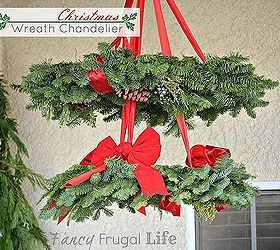 diy poinsettia tree shelf wreath chandelier and my christmas porch, christmas decorations, crafts, seasonal holiday decor, wreaths, Wreath Chandelier