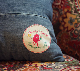 turning special t shirts and old jeans into cute pillows, crafts, repurposing upcycling, The back shoulder of the t shirt had this cute little design that I couldn t leave out so I fused it on the back corner of the pillow