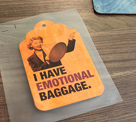 retro wood luggage tags, crafts, Print out a design on your inkjet printer at home and place it on the wood Rub it in with your fingers and use a craft knife or scissors to cut off the excess film from the edges