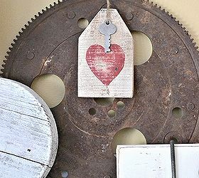 valentine s mantel and heart hang tags, crafts, fireplaces mantels, seasonal holiday decor, valentines day ideas, Wooden hang tags and a rusty gear create a rustic look on my mantel