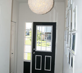 bold black and white door, doors, foyer, painting