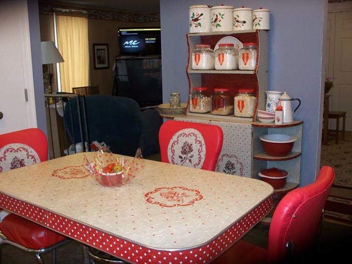 my 1940 s inspired kitchen renovation, home improvement, kitchen design, 1940 s kitchen table and chairs with matching hutch I will post photos of the table and chair renovation later I bought the glass jars at Walmart painted lids red and printed retro stickers to label them