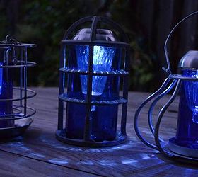 sensational recycled solar lights in the garden, outdoor living, repurposing upcycling, Marie Niemann s brilliant blue lamps from Bud Light beer bottles amazing upcycle