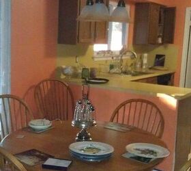 q bright orange walls in breakfast room, home decor, kitchen design, painting, Breakfast room looking into kitchen Yes replacing those icky countertops