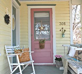 sprucing up a farmhouse porch, outdoor living, porches, An old porch swing and shabby white chair provide outdoor seating