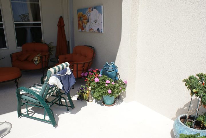 new pictures, landscape, outdoor living, A fish sculpture adds accent color to a corner