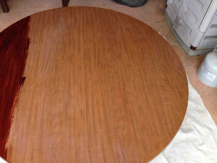 refinishing a dining room table, Table top just starting I began by sanding very lightly with 220 grit Followed by a coat of mahogany polycoats stain Let dry 24 hours