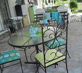 our patio has evolved into an outdoor room and an extension of our home, outdoor furniture, outdoor living, patio, Vintage wrought iron patio set from a yardsale for 25 Most of the things on the patio are from yardsales or were things we already had Stand under the small fridge was curbside find It all came together with paint and fabric